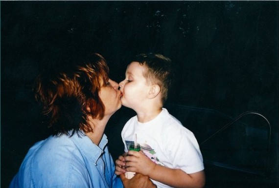 Grandson and Grandma kissing