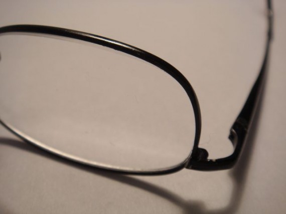closeup photo of reading glasses
