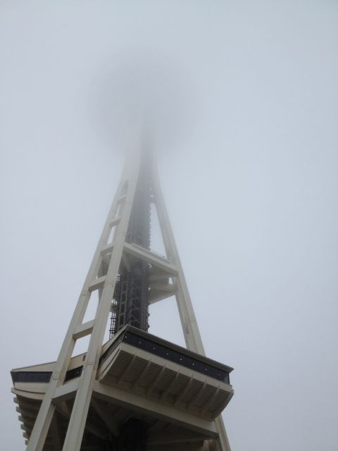 Seattle Space Needle covered in fog
