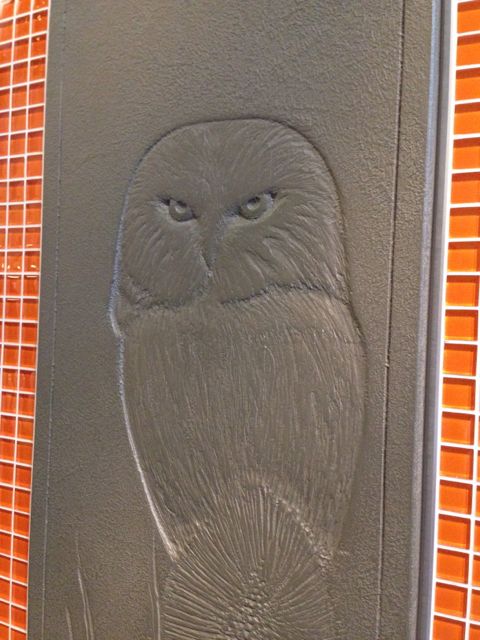 Stone etched owl image