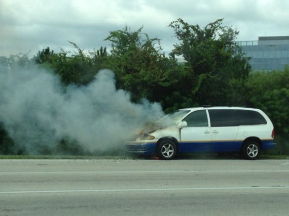 Passenger van on fire along Florida roadway