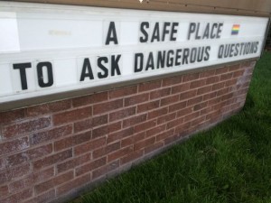 Church sign welcoming tough questions