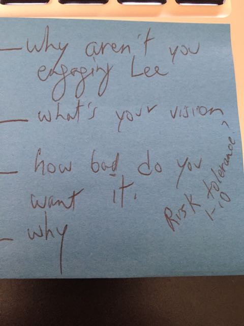 A simple post it note contains key questions.