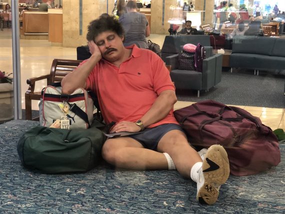 human statue at Orlando airport