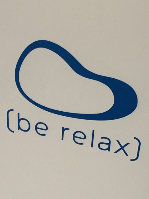 be relax airport sign