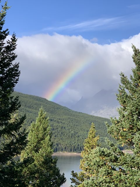 rainbow in mountain landscape