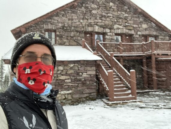 jeff noel in front of Mountain Chalet and snow