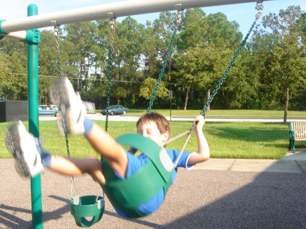 toddler on swing