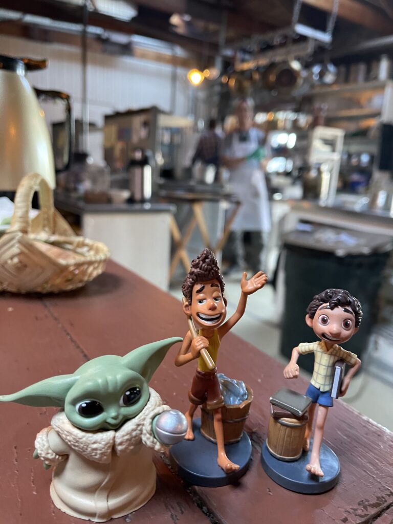 Pixar Lucas toys near a kitchen