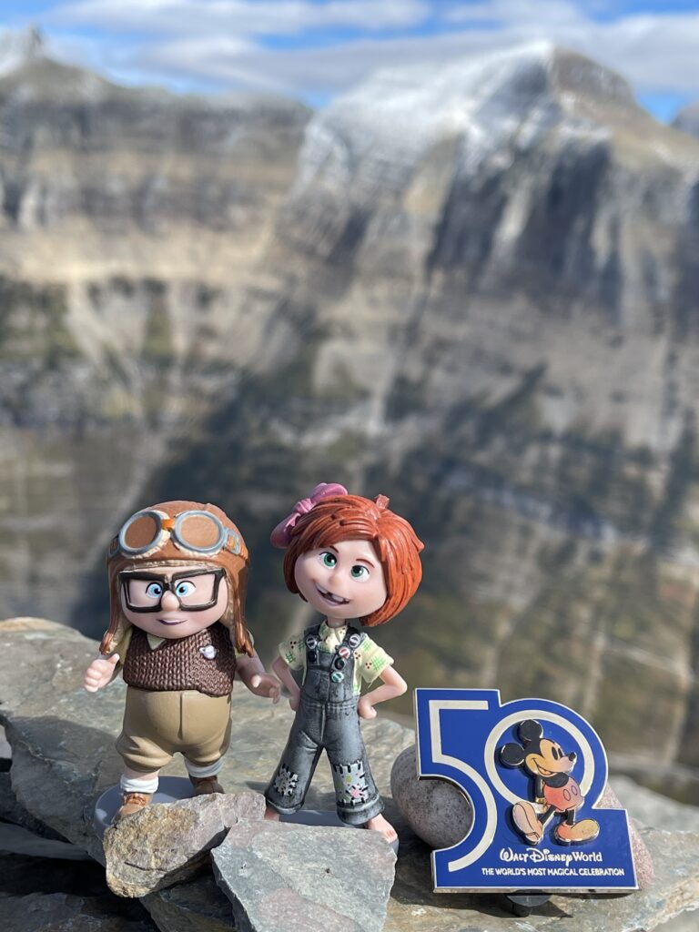 Pixar UP toys and Walt Disney World 50th pin on mountaintop