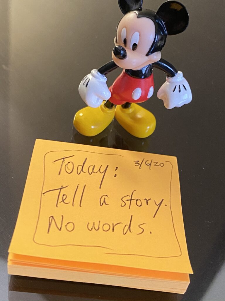 Mickey Mouse toy and post it notes