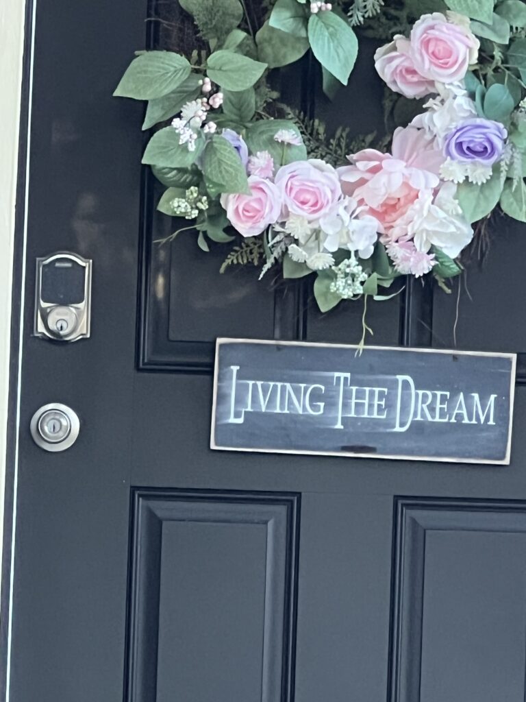 door sign with Living the dream