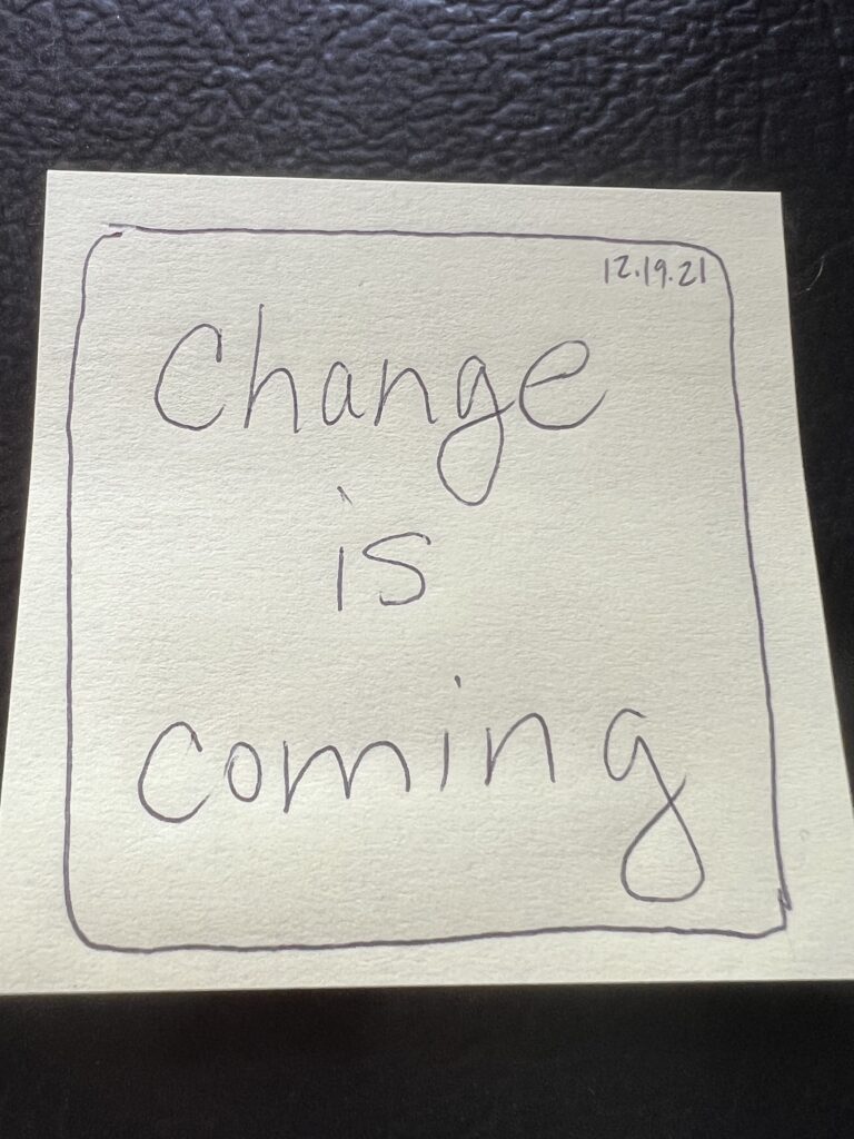 post it note about change is coming