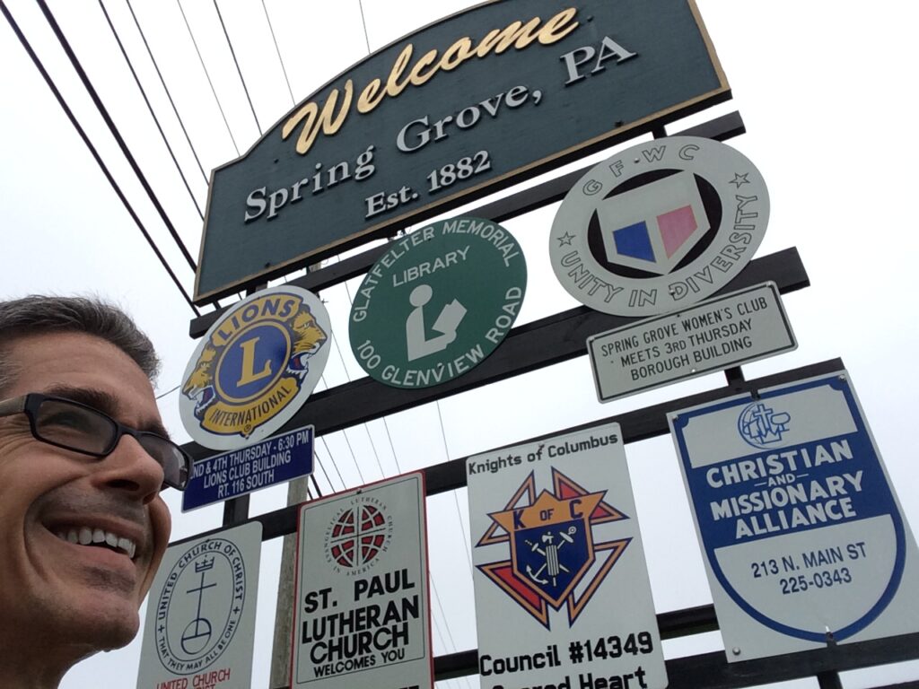 Small town entrance roadside signage board