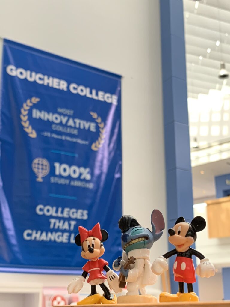 Disney toys at college banner