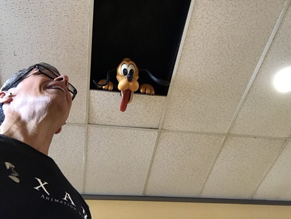 Disney's Pluto in the ceiling tiles