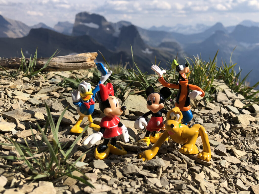 mountains with some small Disney toys