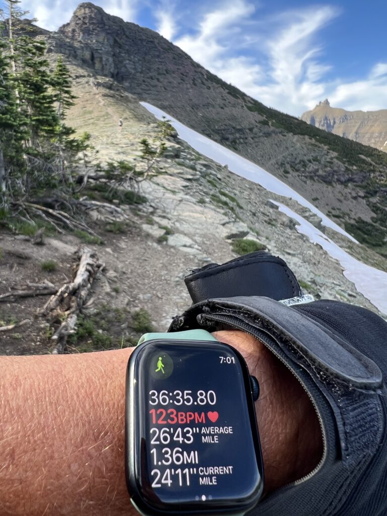 Apple Watch on a wrist in the mountains