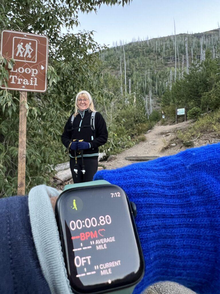 Apple Watch and person hiking