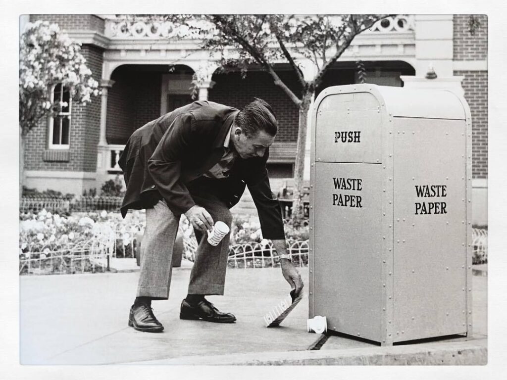 Walt Disney picking up trash