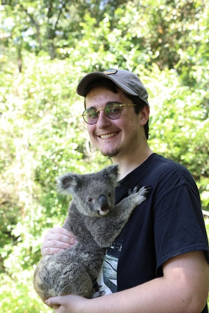 Man holding koala bear