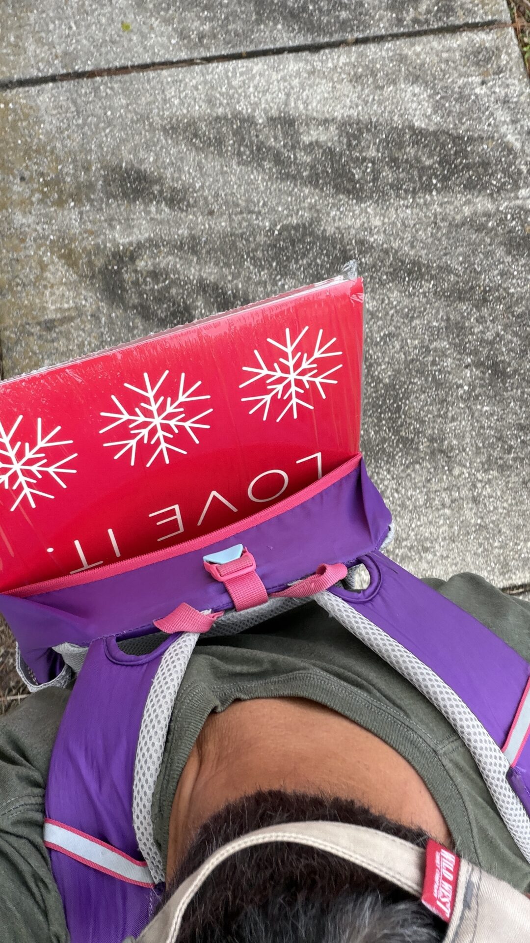 red poster in a backpack