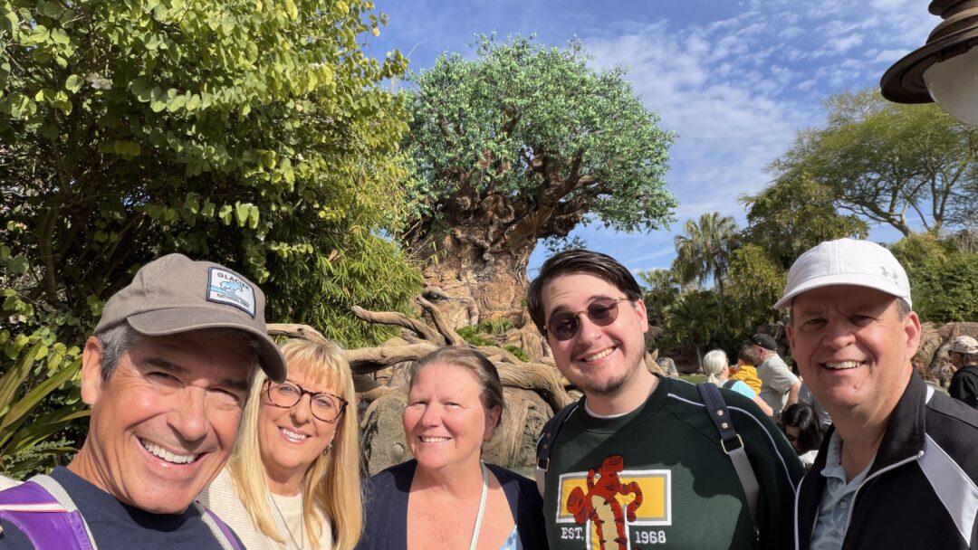 family posing at Disney