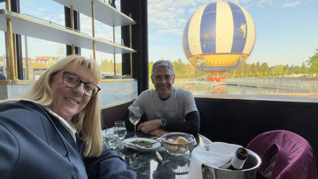 two seniors at restaurant table