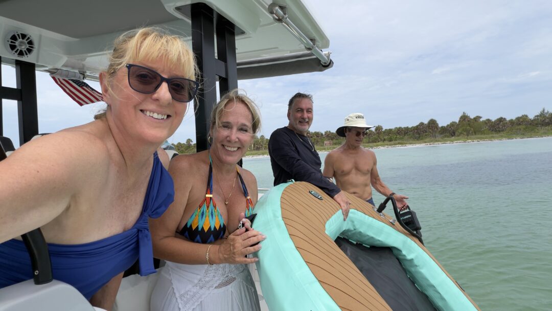 four seniors on a boat