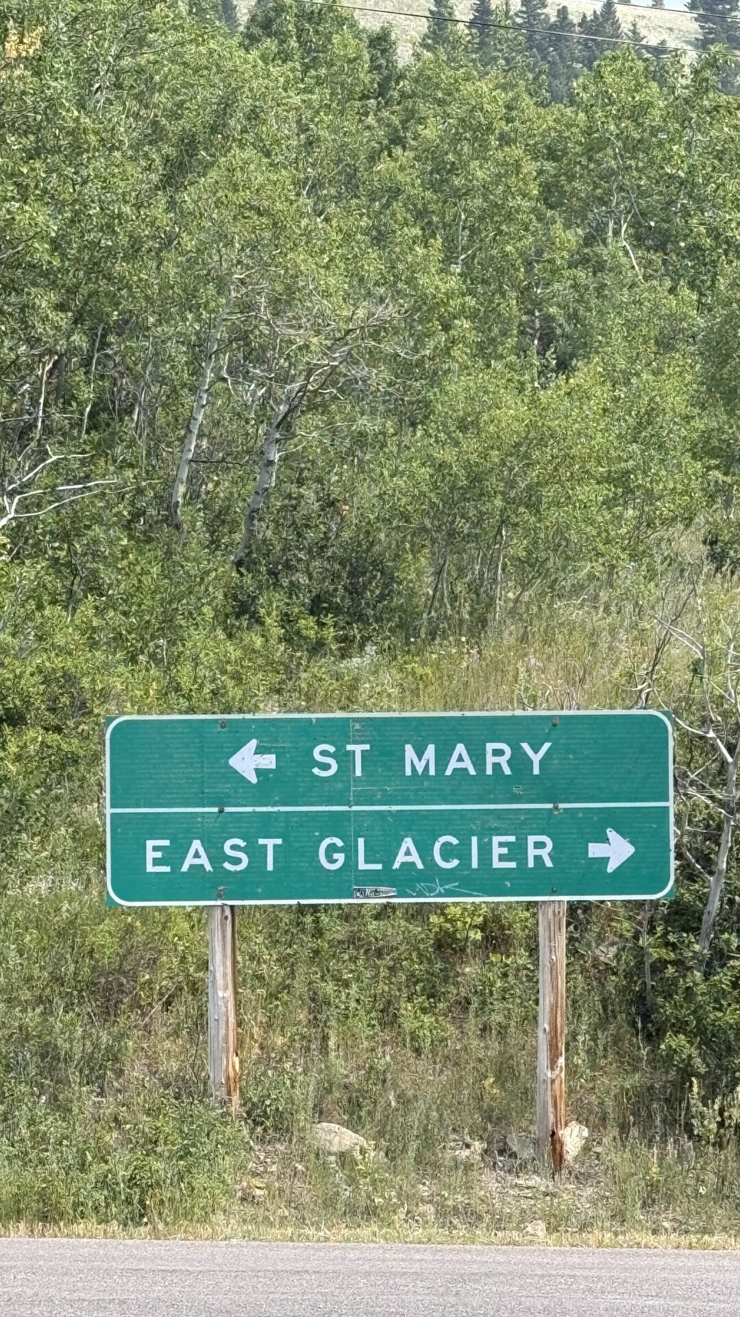 Highway sign to Saint Mary and East Glacier